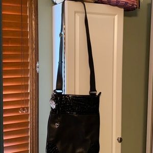 Black leather bag...adjustable leather strap